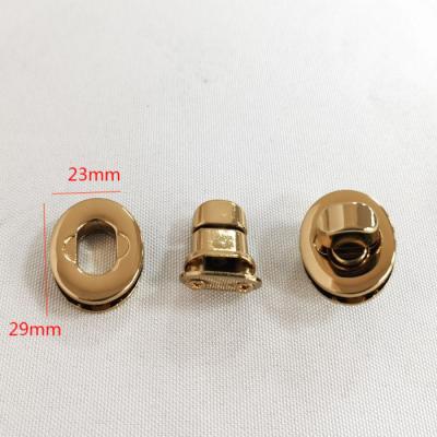 China Custom High Quality Handbag Metal Parts Factory Hardware Ellipse Turn Twist Zinc Alloy Lock for sale