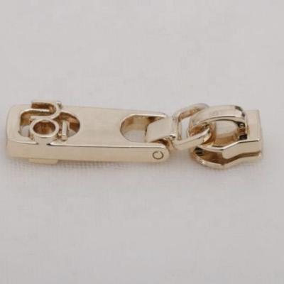 China Custom Zipper Puller New Design Hot Selling Zinc Alloy Metal Zipper Pull For Bag/Clothing/Purse/Luggage for sale