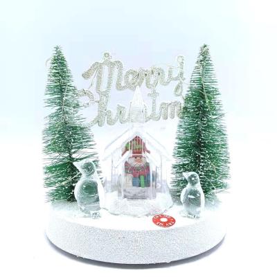 China Festival Stuff Top Sale Lovely Christmas Decoration Lit Miniature Resin Christmas Tree Scene With Music for sale