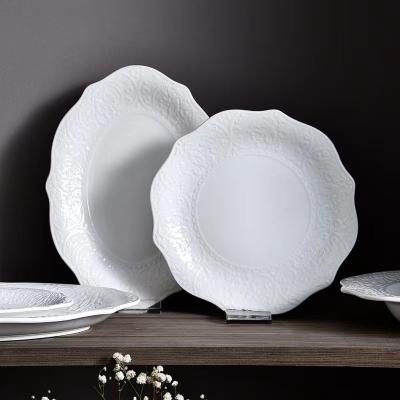 China Viable Stock Cheap Wedding Anniversary Party Supplies China Luxury Ceramic Relief Dinnerware Set for sale