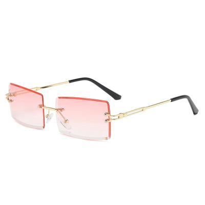 China Hot Selling Fashion Sunglasses Street Custom Sunglasses Fashion Sunglasses 2021 Colorful Rimless Sun Glasses for sale