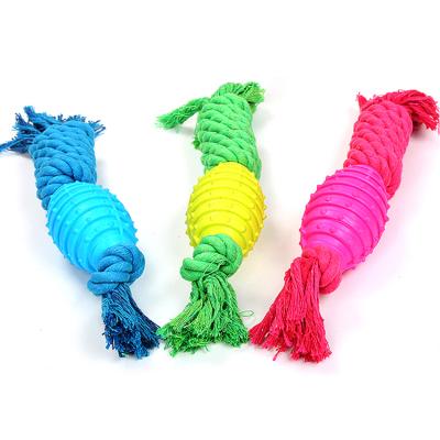 China High Quality Viable Candy Color TPR Rubber Rugby Ball With Cotton Knot Rope Bite Resistance Dog Chew Toy for sale