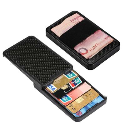 China Unique RFID Push Up Carbon Fiber Minimalist Slim Wallet For Men And Women for sale