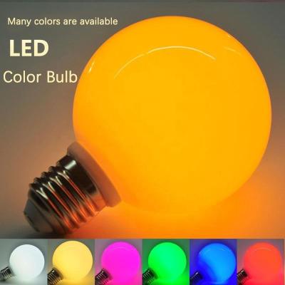 China Residential decorative yellow green purple pink red light energy saving blue color globeE27Screw lead glass bulb eye protection light lamp for sale