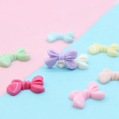 China 20pcs/bag 25x16mm Europe Pastel Colors Resin Bows Links Flatbacks Cabochons Embellishments DIY Scrapbooking Crafts for sale