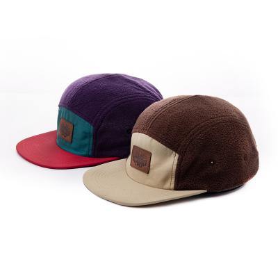 China JOINT Custom Fleece Warmth Fleece 5 Panel Closure 5 Panel Unstructured Plastic Hat With Suede Patch for sale