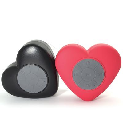 China Wireless Charger For 2023 New Product Heart Shaped Speaker Portable Bluetooth Speaker Mobile Phone Mini Wireless Music Speaker Bluetooth for sale