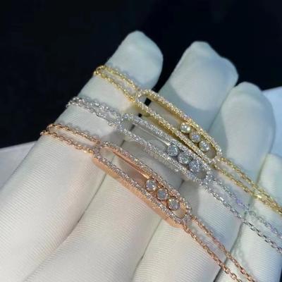 China Jewelry Customized AU750 Gold Move Bracelet 18K Yellow Gold With Diamonds 3 Dimonds Moveable Chain for sale