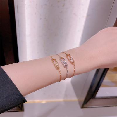 China Customized 18K Gold Luxury Diamond Jewelry AU750 Gold Lucky Move Bracelet for sale