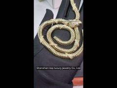 serpenti 18 kt yellow gold necklace set with demi pavé diamonds and black onyx eyes