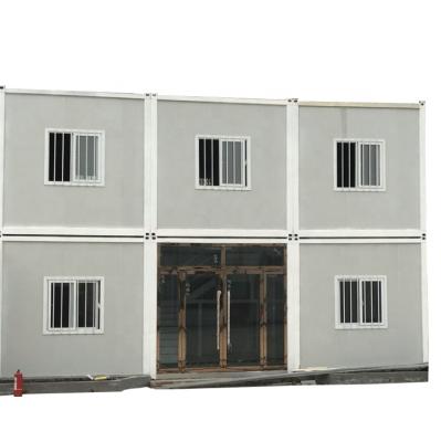 China 2 Storey Industrial Titan Dome Prefab Steel Frame Sandwich Panel Flat Pack Container House for sale