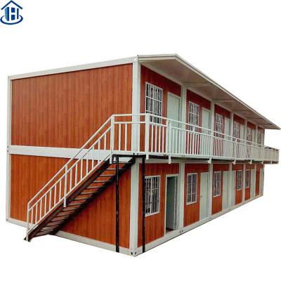 China Industrial Porcelain Rendered 2 Story 40ft Modified Design Shipping Modular Prefab Container Homes Plans In European USA for sale