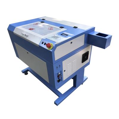 China Laser Engraving 300x500 Mm Mini Laser Engraving And Cutting Machine Redsail Laser Made In China for sale