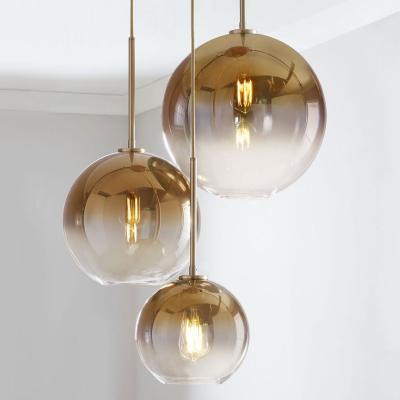 China Modern chandelier classic home decor e27 gold round led modern glass bubble ball pendant light for sale