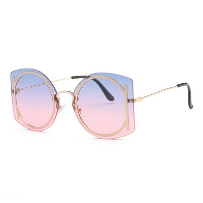 China 2021 New Fashion Style Women's Rimless Oversized Frameless Sunglasses Rimless Gafas De Sol for sale