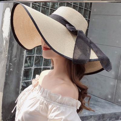 China Custom Made Wide Logo Floppy Summer Straw Hats Sun Protection Outdoor Women's Bow Brim Sun Beach Hat for sale