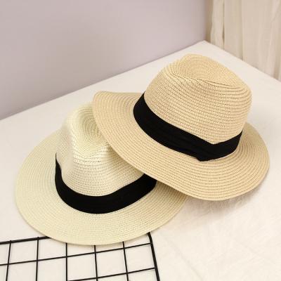 China Custom Wide Brim Hat Ladies Foldable Panama Straw Beach Hats Summer Sun Protection Vacation for sale