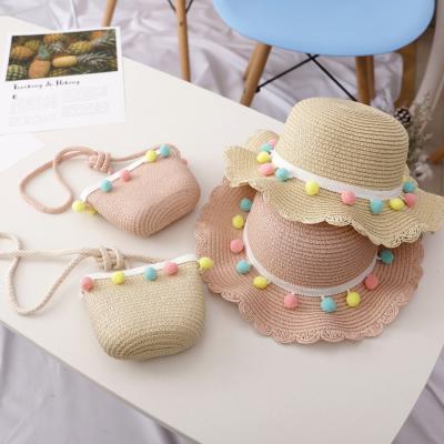 China Tassel Straw Kids Hats 2021 Sun Protection Cute Beach Baby Hat And Bag Set for sale