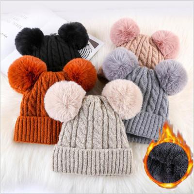 China COMMON Women Plus Wholesale Pom Pom Beanie Winter High Quality Fleece Beanies for sale