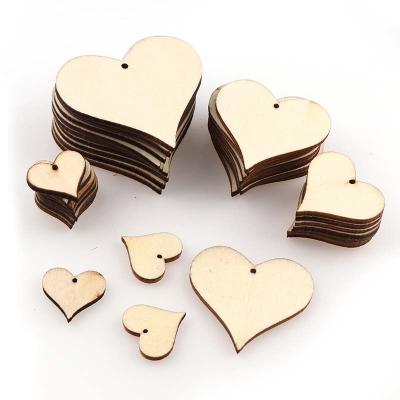 China Europe Mixed Size DIY Perforated Heart Wood Patch Crafts Scrapbooking Supplies Wedding DecorationHand-made Graffiti Buttons for sale