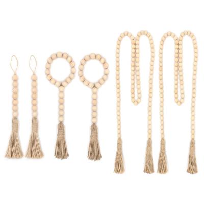 China Handmade Wooden Bead Garlands With Jute Rustic Tassel Wooden Home Decor DIY Decoration For Rattan Macrame Wall Hanging Boho Gift for sale