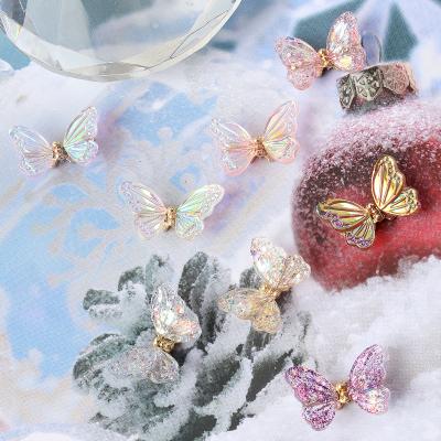 China Full Color Nails Featuring Holographic Floating Aurora Butterfly Bow Resin Charm Nail Art Charms Supplies for sale