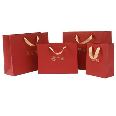 China Recyclable Luxury Ribbon Handles Printed Premium Paper Boutique Shopping Carry Bags With Logo For Jewelry Shopping Gift Packaging for sale