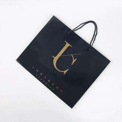 China Handmade Custom Printing Boutique Handles Black Luxury Apparel Fashion Shopping Art Paper Gift Bag For Shopping for sale