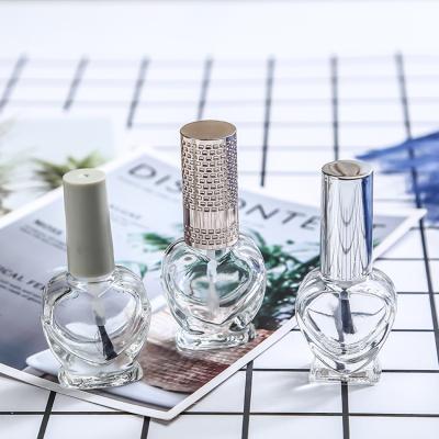 China Wholesale Luxury Empty Personal Care Design 10ml 15ml Nail Polish Glass Bottle UV Nail Polish Bottle With Brush Cap for sale