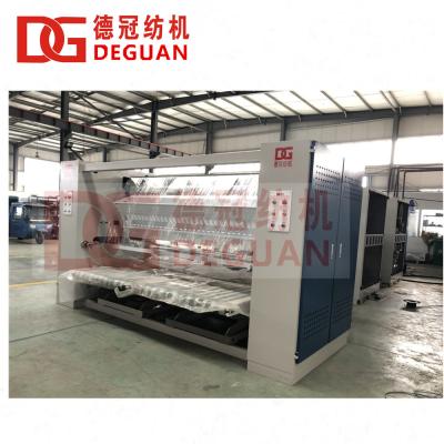 China Garment Shops DEGUAN Cloth Folding Machine For Tubular And Open Cloth for sale