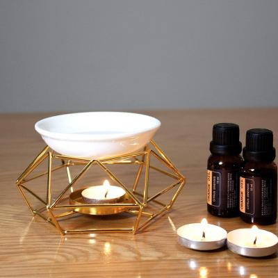 China Essential Oil Burner Ceramic and Iron Wax Melter Candle Golden Wax Warmer Tealight Candle Holder 19*8.5*14 for sale