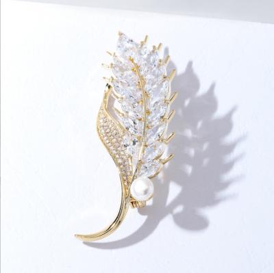 China Metal Maxery classic diamond set brooch yellow temperament spike natural wheat zircon fritillaria leaf brooch for sale