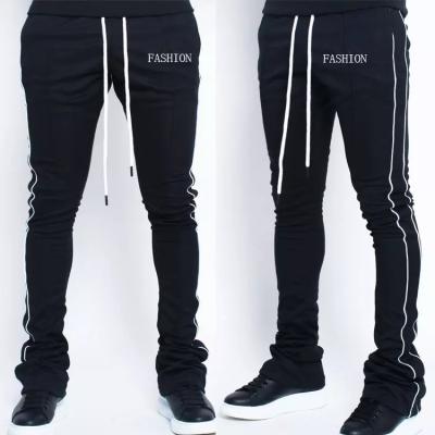 China 2022 New Fashion Anti-Static Mens Skinny Pants Stripe Track Pants 3M Reflective Stacked Sweatpants Mens Fit Joggers With Drawstring for sale