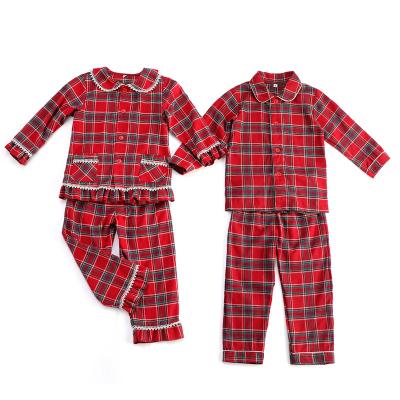 China Flannel Thermal Fabric Plaid Family Christmas Long Sleeves Button Up Kids Girls and Boys Pajamas for sale