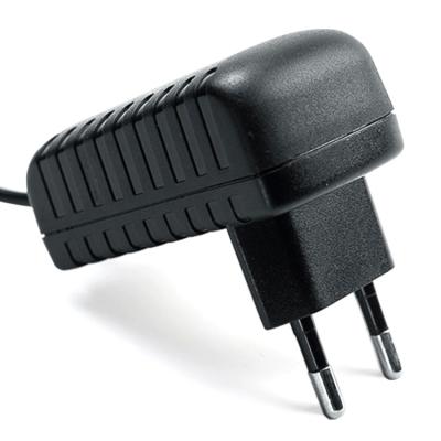 China PC+ABS 12v 1a Ac/dc Power Adapter 12v Power Adapter With Eu Plugs 100-240v AC 5.5 x 2.1mm Adapter for sale