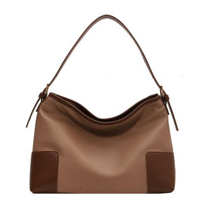 China Summer/Fashion/High Quality Soft Leather Cross - Retro Texture Body One-Shoulder Armpit Bag Portable Tote Bag for sale