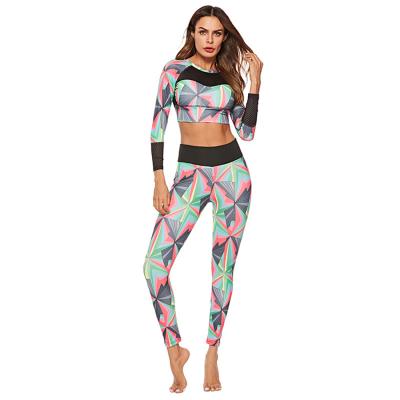 China New style fashion print antibacterial gaiters butt wholesale high waist lifting gaiters and pants sports bra set for sale