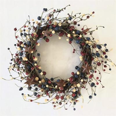 China Pure handmade artificial pip berry wreath with metal rust star for door decoration. for sale