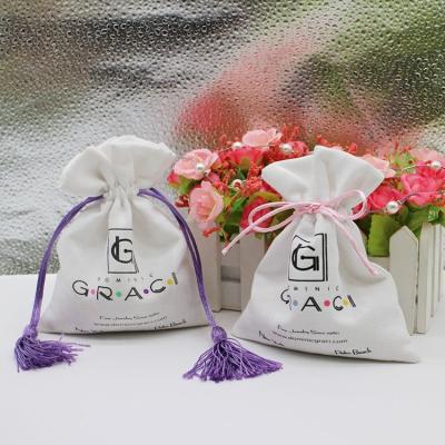 China Recyclable Luxury Soft Suede Jewelry Pouches Wedding Favor Bags With Logo White Gift Bags Drawstring for sale