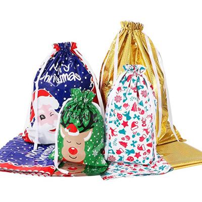 China Creative Christmas Santa Claus Deer Santa Sack Fashion Christmas Plastic Folding Drawstring Gift Bags for sale