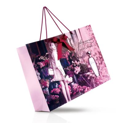 China Ambient ECO Friendly Personality Custom Printed White Luxury Brand Retail Packaging Clothing Shopping Paper Bags for sale