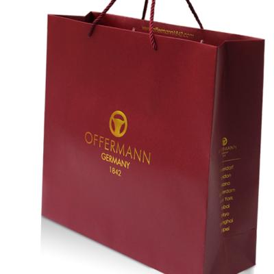 China ECO Environmental Paper Bag Clothing Friendly Custom Shoe Logo Offermann Shopping Packaging Gift Cheap Washable Paper Bag for sale