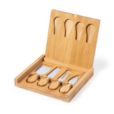 China Sustainable Square Bamboo Cheese Board Bamboo Cutting Board With Knives Set Hiding In Folding Drawer for sale