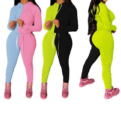 China Breathable Spring Two Tone Drawstring Joggers Women Workout Teams Clothing Patchwork 2 Piece Pile Pants Sets for sale