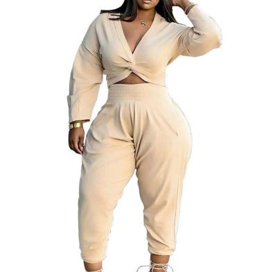 China 2022 Solid Color Spring Breathable Casual Twist Long Sleeve Two Piece Crop Top And Pants Set Women for sale