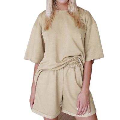 China Latest QUICK DRY High Quality Breathable Oversized Short Sleeve Half Panties Upper Solid Tracksuit Summer Tracksuit With Pocket for sale