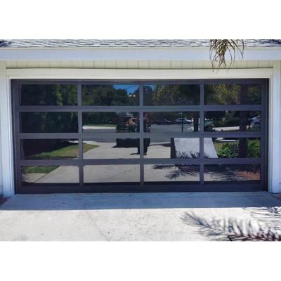 China Heat insulation low price hinge garage doors with reasonable prices and high quality polycarbonate garage doors for sale