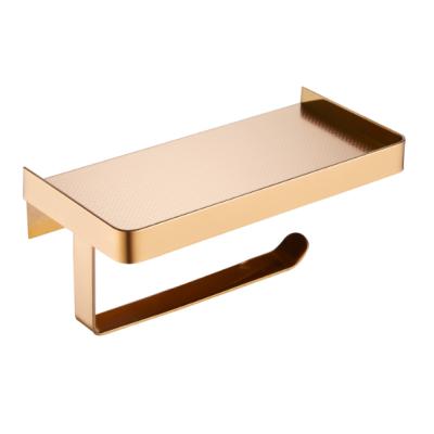 China Modern high quality 304 stainless steel gold surface toilet paper holder with shelf for sale