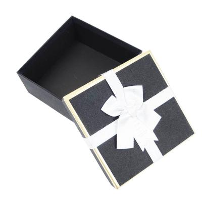 China Custom Order Recyclable Candle Foldable Packaging Paper Lid and Base Gift Boxs with Ribbon for sale