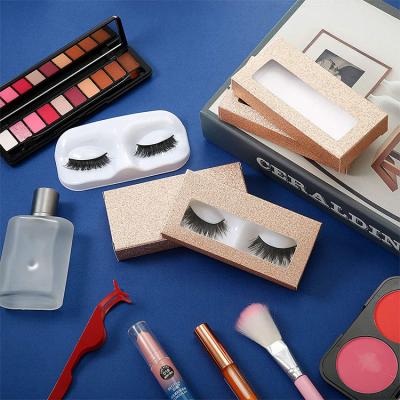 China Custom Logo Printed Glitter Empty Cosmetic Eyelash Packaging Boxes for False Eyelashes for sale